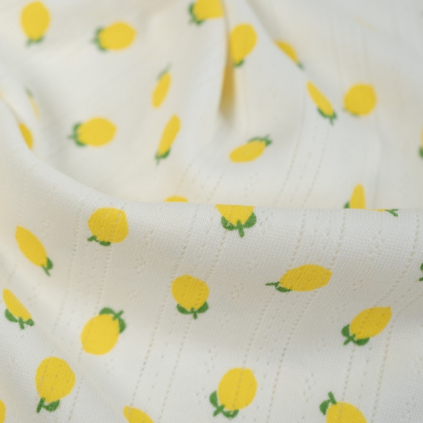 Baumwoll Lochstrick Jersey Zitronen ecru