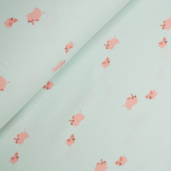 Baumwolljersey kleine Schweinchen pastellmint