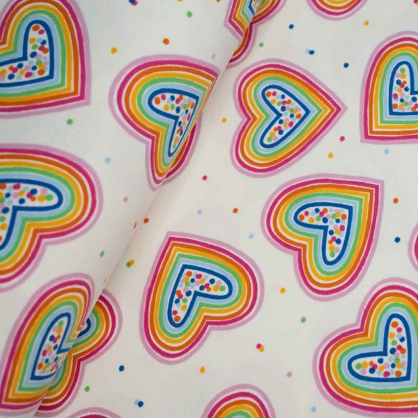 Baumwolljersey Regenbogen Herzen ecru