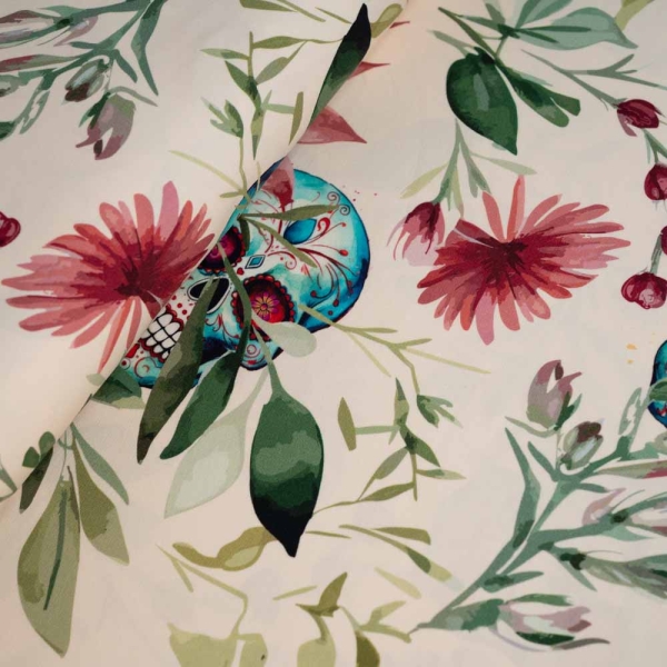 Baumwolljersey Totenkopf & Blumen vanille